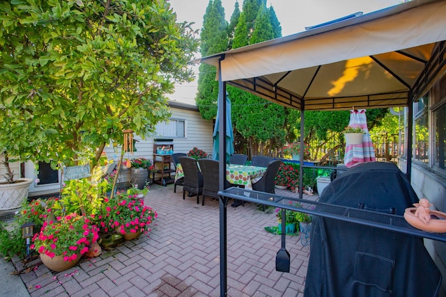4551 W Foster Ave, Chicago, IL 60630 - view of patio with a grill and a gazebo