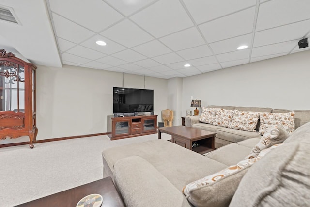 carpeted living area with visible vents, recessed lighting, baseboards, and a drop ceiling