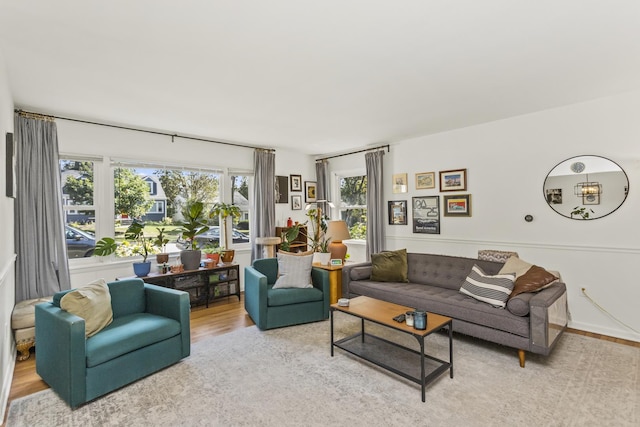 living room with light hardwood / wood-style flooring