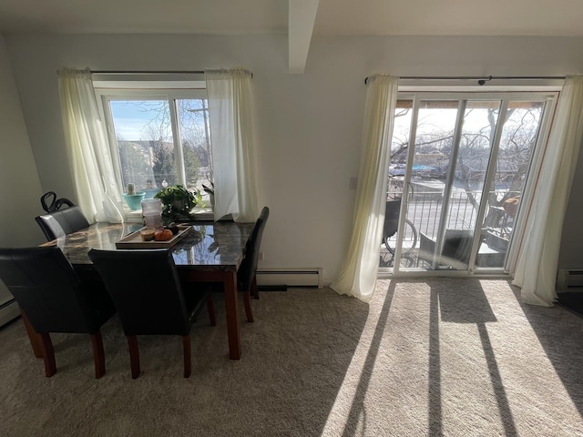 dining area with carpet flooring, a wealth of natural light, and beam ceiling