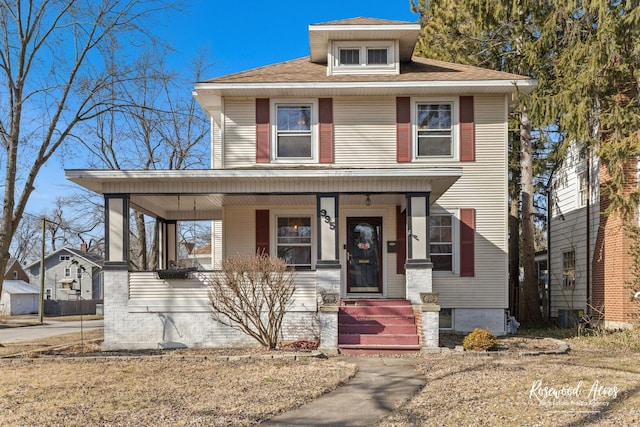 view of front of home with central AC and covered porch