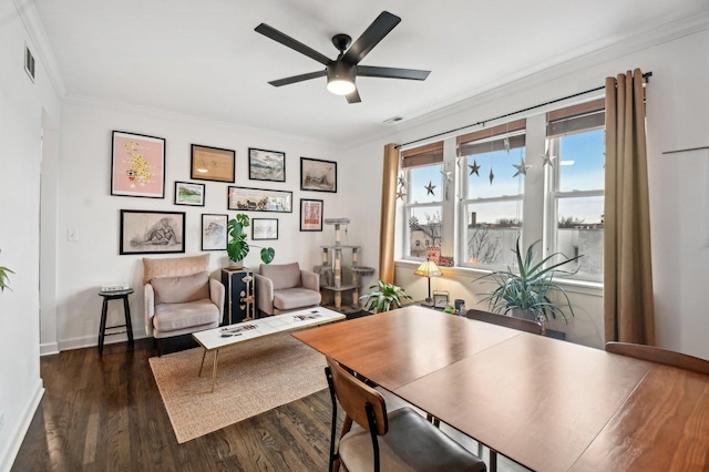 office with visible vents, baseboards, a ceiling fan, wood finished floors, and crown molding