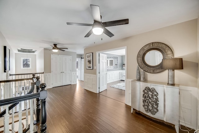 foyer entrance featuring dark wood-type flooring