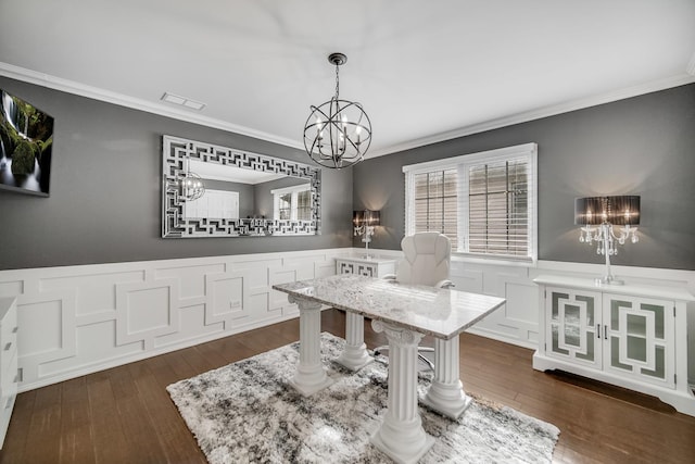 office space with dark hardwood / wood-style flooring, a notable chandelier, and crown molding