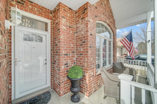 property entrance featuring covered porch