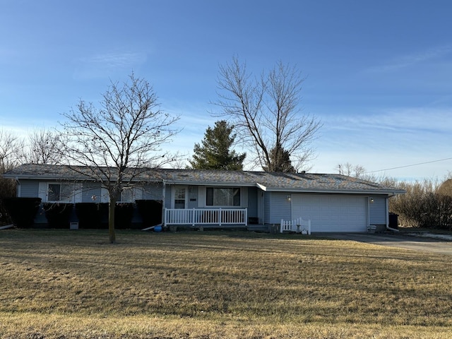 single story home featuring a porch, a garage, and a front yard