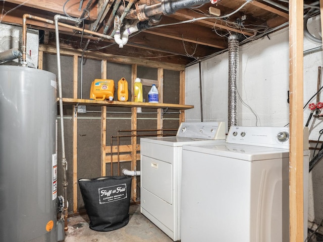 laundry area with laundry area, separate washer and dryer, and gas water heater