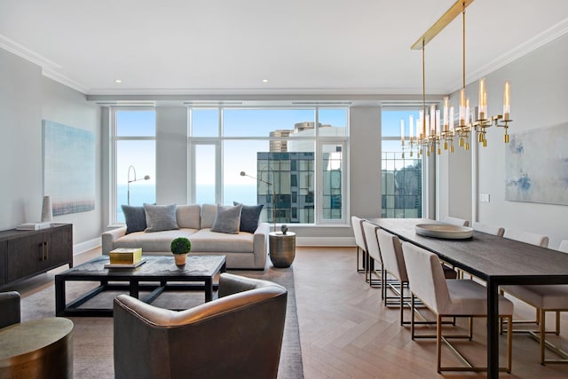 living room featuring crown molding, parquet flooring, and an inviting chandelier