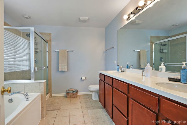 full bathroom with tile patterned floors, toilet, separate shower and tub, and vanity