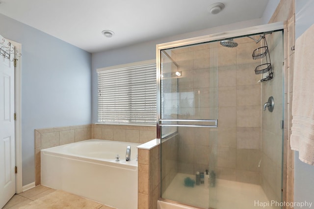 bathroom with plus walk in shower and tile patterned floors