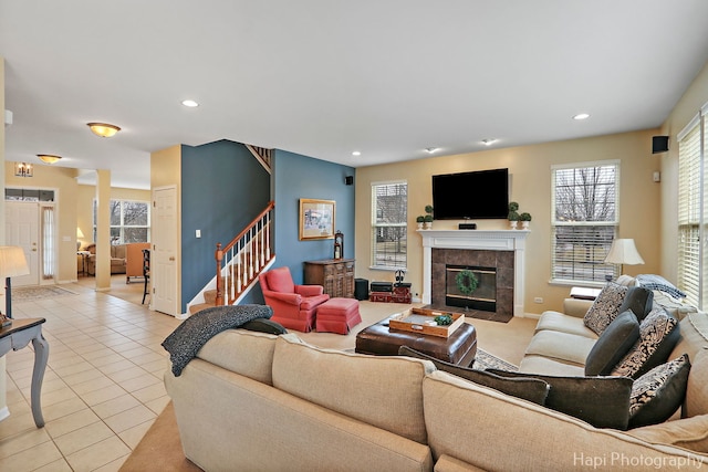 tiled living room featuring a fireplace