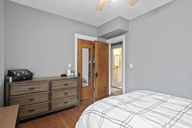 bedroom featuring ceiling fan and dark hardwood / wood-style floors