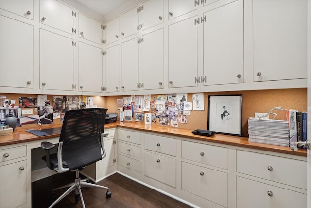 office space with dark wood-style flooring and built in study area