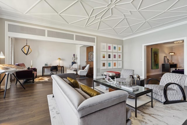 living area featuring baseboards, wood finished floors, and ornamental molding