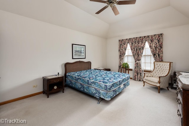 carpeted bedroom featuring ceiling fan and lofted ceiling