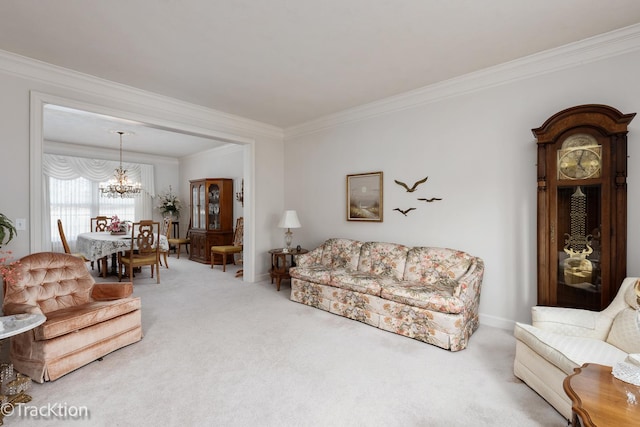 carpeted living room with crown molding and a notable chandelier