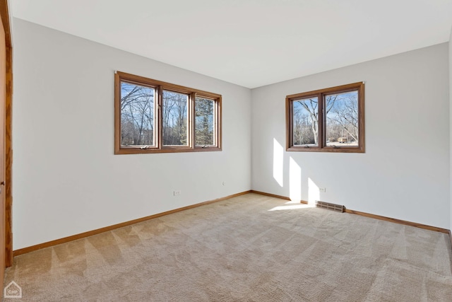 view of carpeted spare room