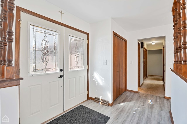 entrance foyer featuring light hardwood / wood-style floors