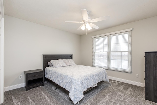 bedroom featuring ceiling fan and carpet flooring