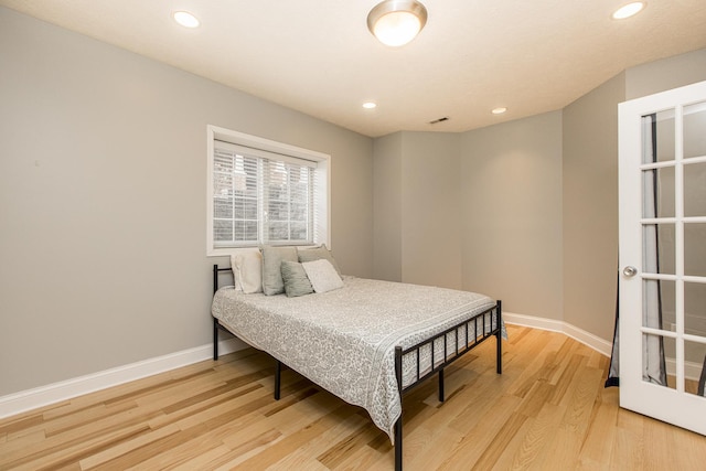 bedroom featuring light wood-type flooring