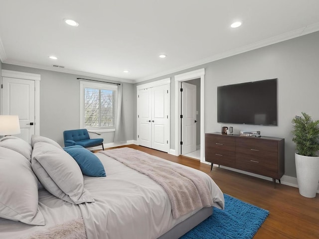 714 Walnut Dr Unit 109, Darien, IL 60561 - bedroom featuring ornamental molding, recessed lighting, and dark wood-style flooring