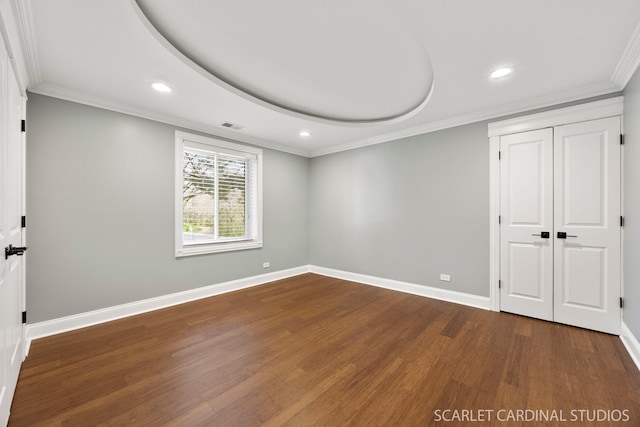 714 Walnut Dr Unit 109, Darien, IL 60561 - unfurnished bedroom with visible vents, baseboards, recessed lighting, dark wood-type flooring, and ornamental molding
