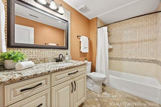 714 Walnut Dr Unit 109, Darien, IL 60561 - bathroom featuring visible vents, toilet, vanity, and shower / tub combo