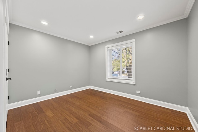 714 Walnut Dr Unit 109, Darien, IL 60561 - empty room featuring wood finished floors, baseboards, and crown molding