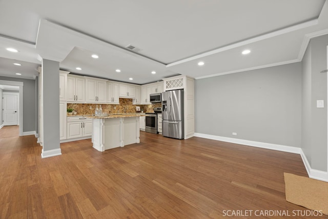 714 Walnut Dr Unit 109, Darien, IL 60561 - kitchen featuring baseboards, visible vents, stainless steel appliances, and backsplash