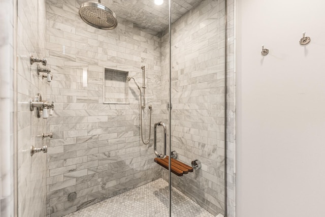 full bathroom featuring a shower stall