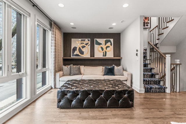 bedroom with access to exterior, recessed lighting, baseboards, and wood finished floors