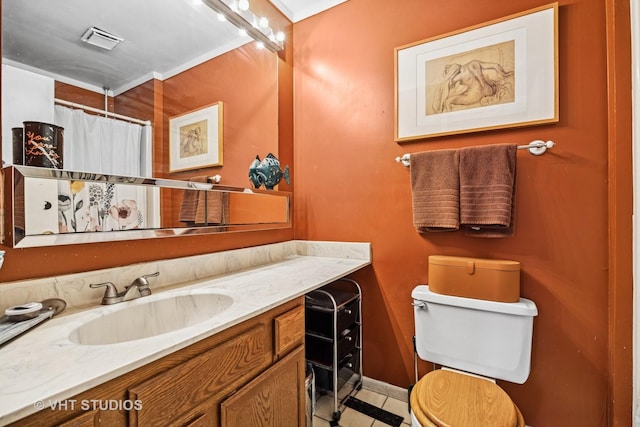 full bathroom featuring toilet, visible vents, and vanity