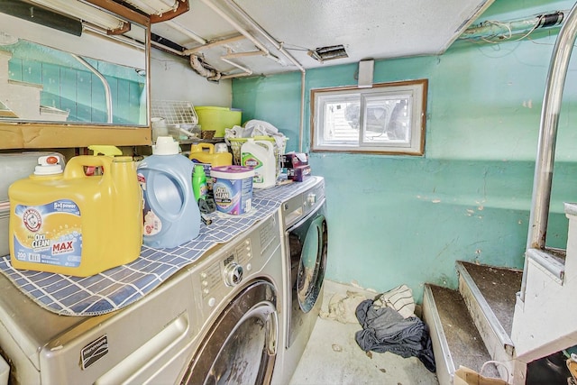 laundry area featuring washer and clothes dryer