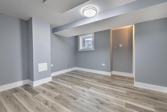 basement featuring light wood-type flooring