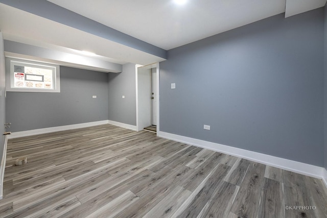 basement featuring light wood-type flooring