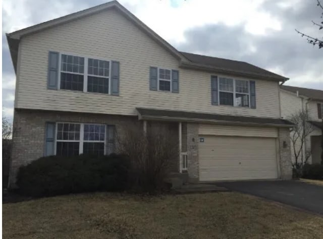 front of property featuring a garage