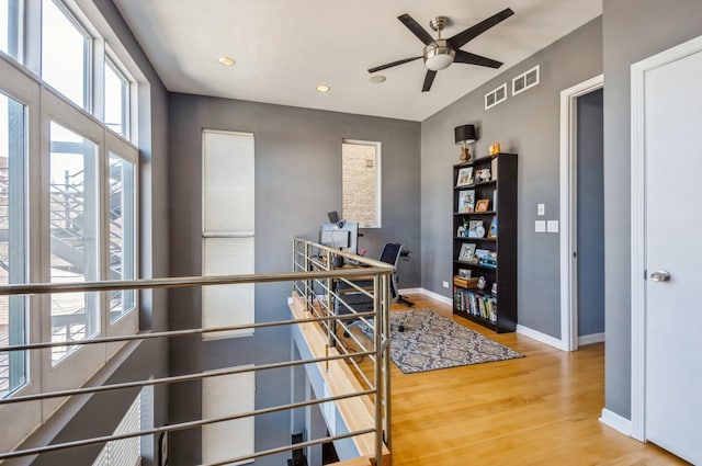 office featuring ceiling fan and wood-type flooring