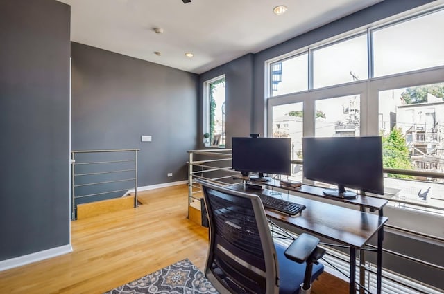 office area with hardwood / wood-style floors