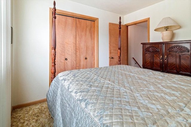 carpeted bedroom featuring a closet