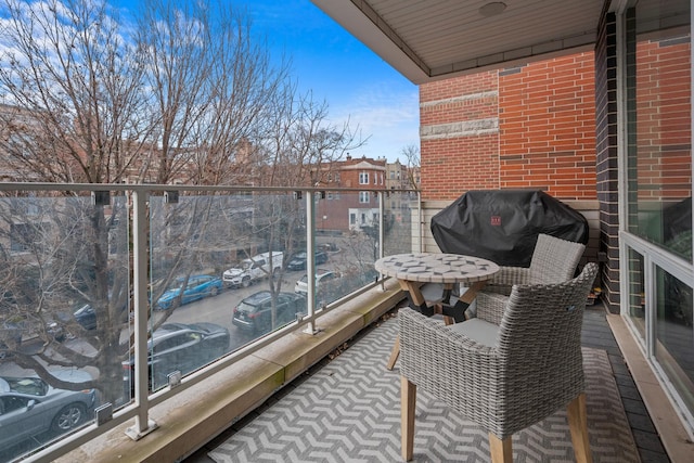 balcony featuring a grill