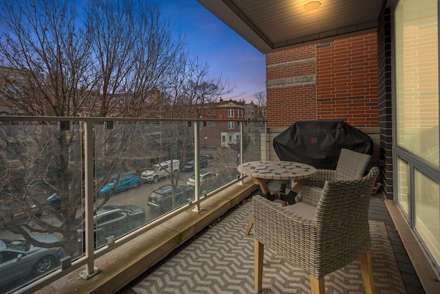 balcony at dusk with grilling area