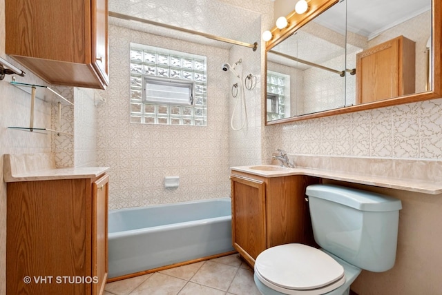 bathroom featuring toilet, vanity, shower / washtub combination, and tile patterned floors