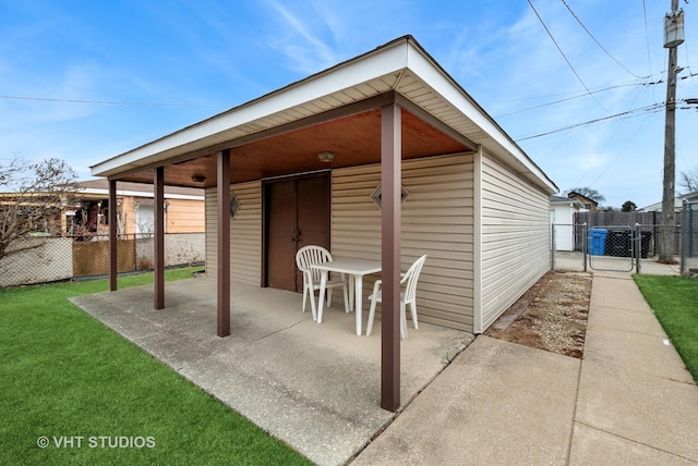 exterior space with fence and a gate