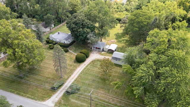 birds eye view of property with a rural view