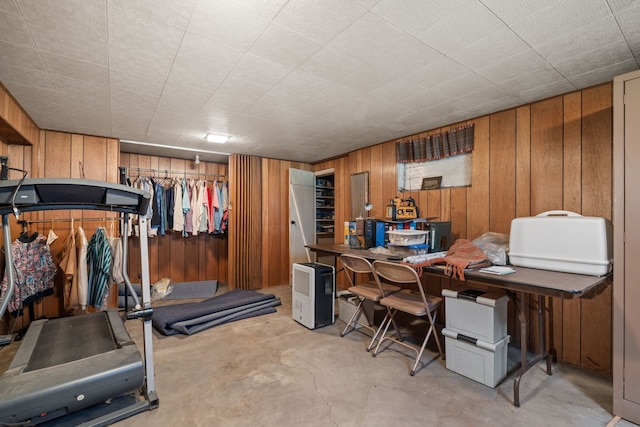 home office featuring wooden walls