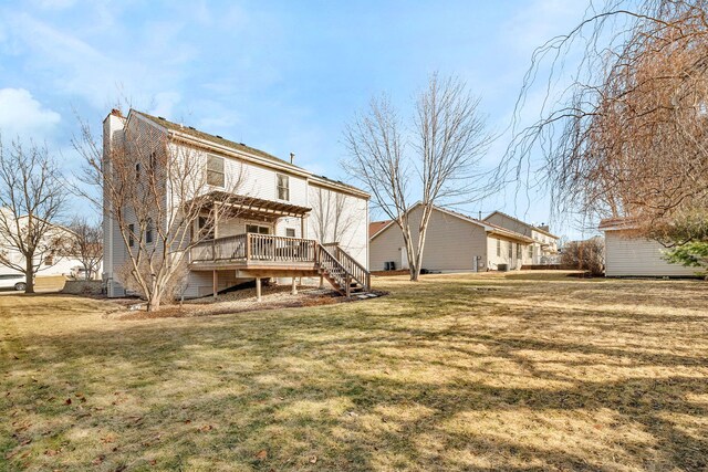 view of yard with a pergola and a deck