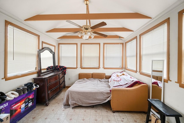 bedroom featuring vaulted ceiling with beams and ceiling fan