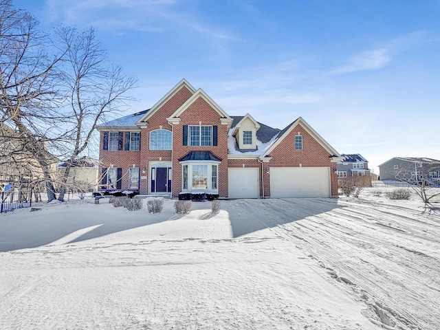 view of front of property featuring brick siding and an attached garage