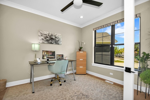 office area with ornamental molding and ceiling fan