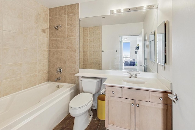 full bathroom featuring shower / washtub combination, vanity, and toilet